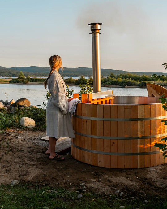 Wooden hot tub on the lake