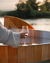 Cedar hot tub with wine glass