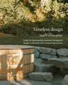 Electric cedar hot tub surrounded by stone steps and greenery in a tranquil outdoor setting.